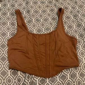 a brown crop top